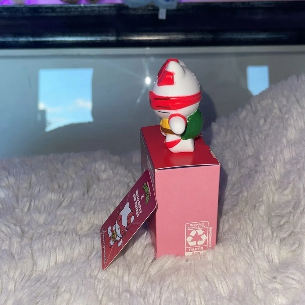 McDonald’s happy meal Sanrio Hello Kitty x Raphael Figure for a game of sorts